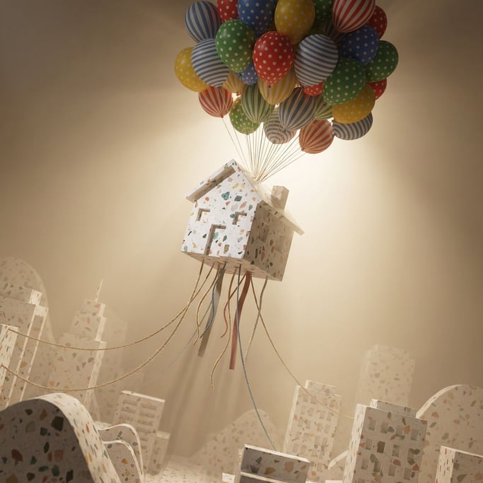 A cluster of balloons carrying a small white house upward, strings trailing below, whimsical ascent (twvjchyr)
