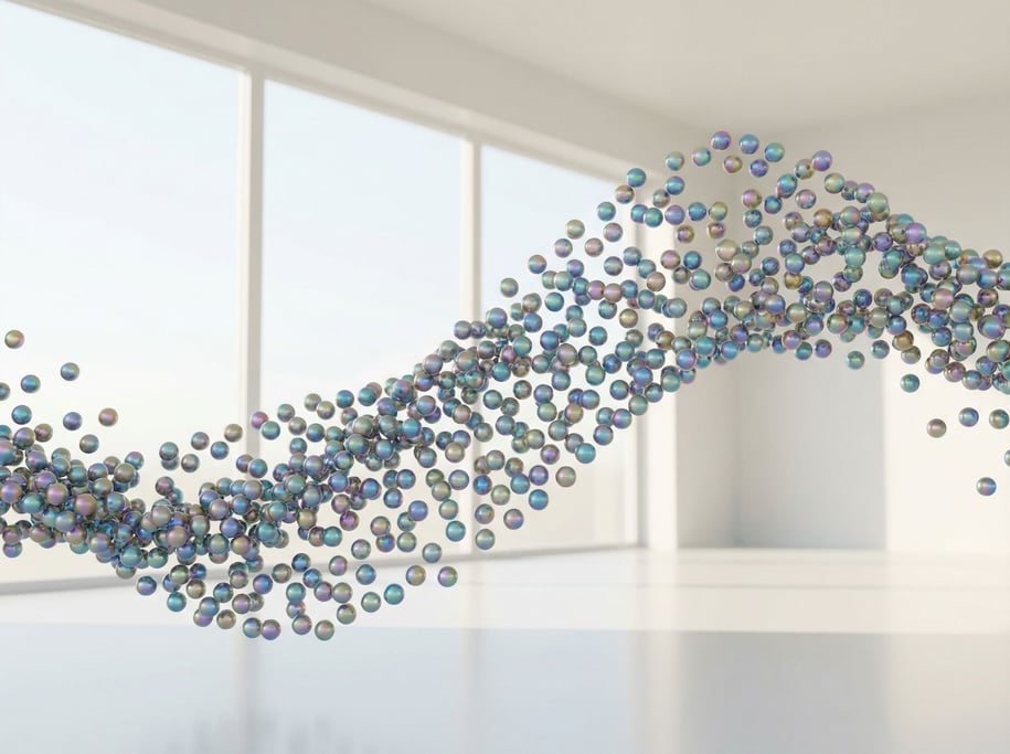 Hundreds of tiny spheres arranged in a wave formation, particle simulation frozen mid-flow (rmez4i)