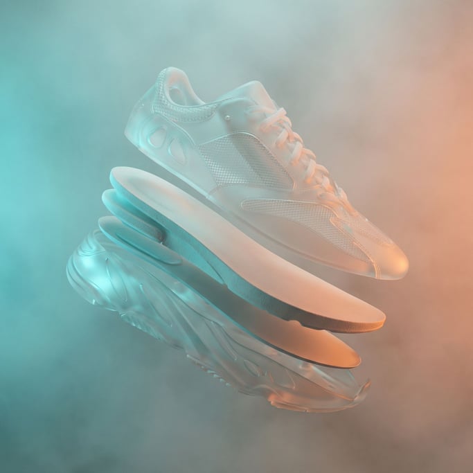 A sneaker deconstructed into floating parallel layers showing every material in the sole and upper