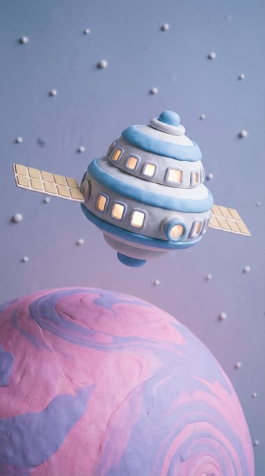 Clay space station orbiting a pastel planet — the station rounded and friendly in white and baby blue