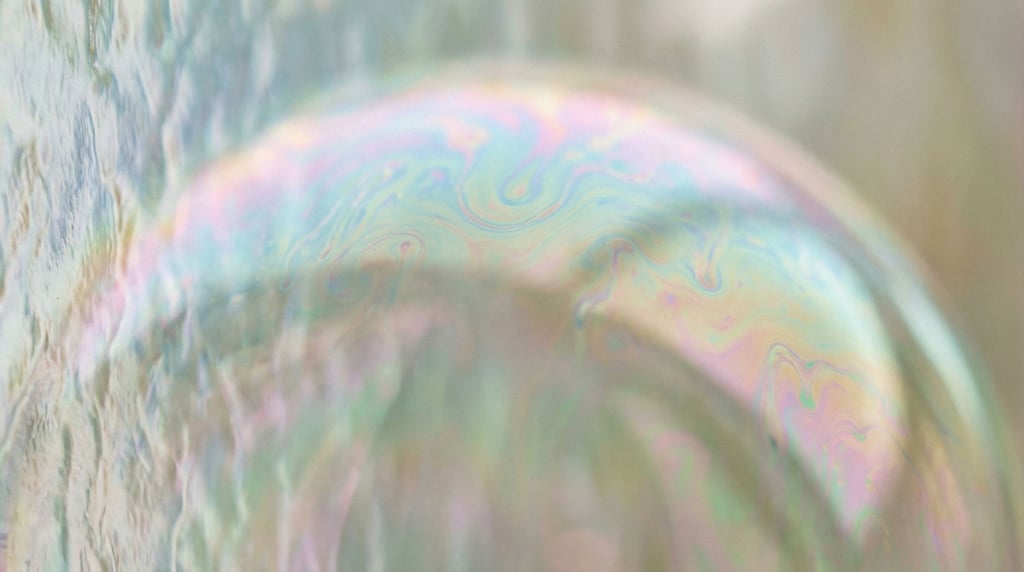 Macro shot of soap bubbles, iridescent surface tension and interference patterns