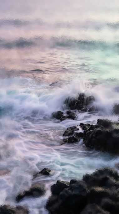 Ocean waves over black volcanic rock, long exposure turning water to silk (pjtcfsa2)
