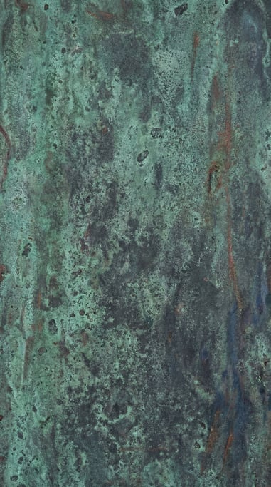 A close-up of oxidized copper surface, verdigris green against dark metallic gray (bj4obgsz)