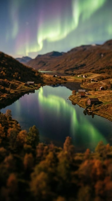 Northern lights reflected in a still lake, green and purple curtains doubled in the water