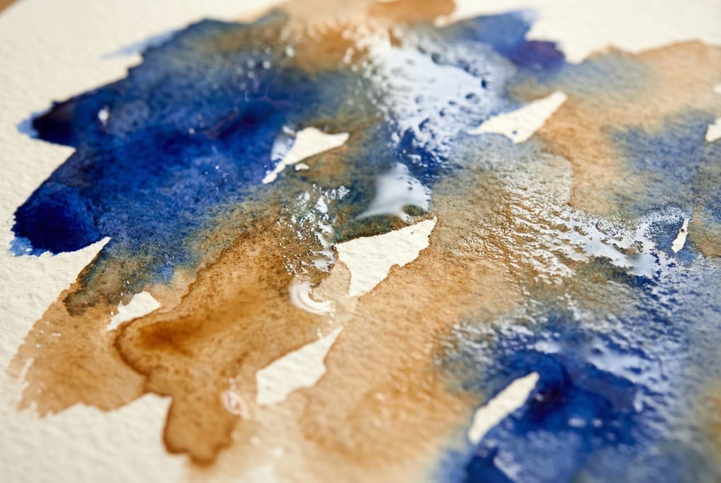 Wet watercolor washes bleeding into each other on rough cotton paper