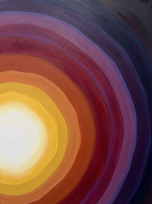 Concentric rings of color pulse outward from the lower-left corner of the vertical frame