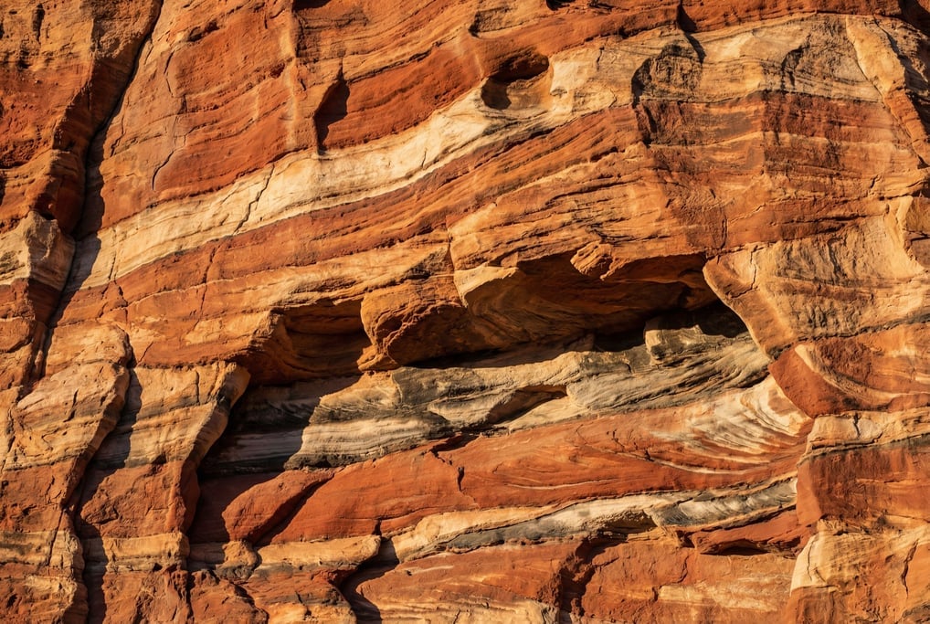 Rock strata exposed in a cliff face
