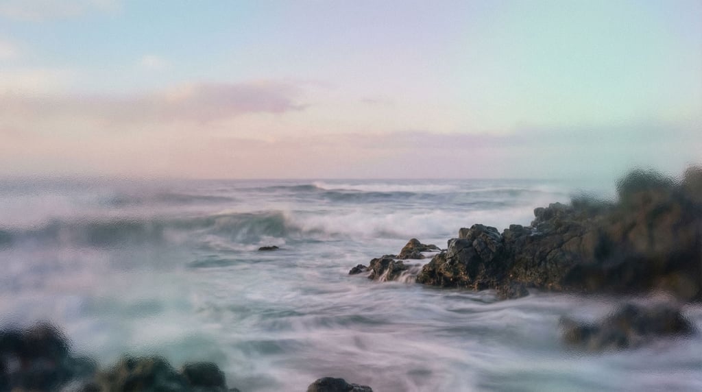 Ocean waves over black volcanic rock, long exposure turning water to silk (6hzw5mp)