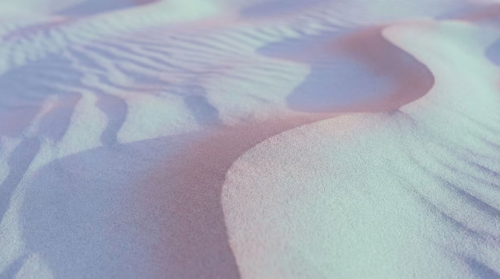 Sand dunes seen from above, abstract curves and soft shadows in cool morning light (syjlnlrj)