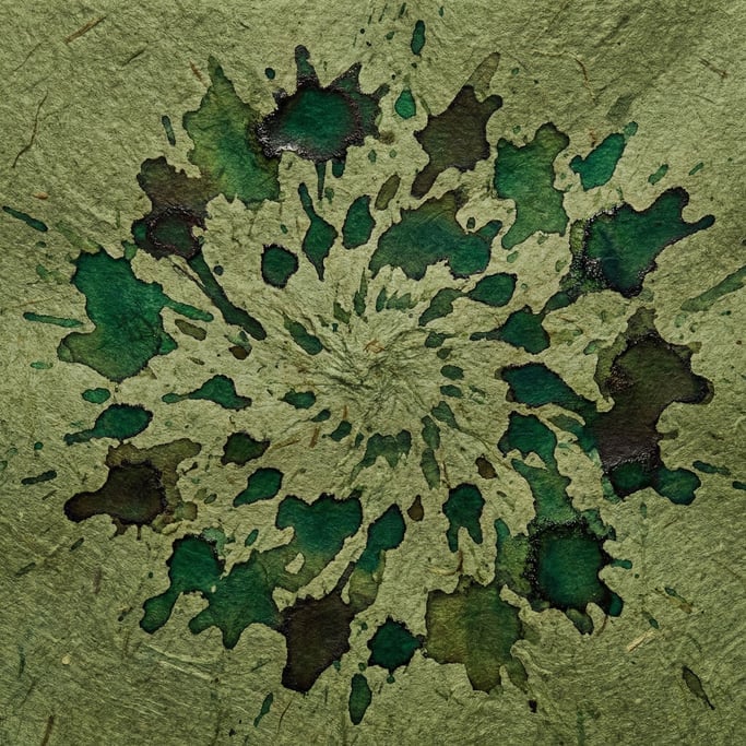 Spilled coffee creating organic stain patterns on textured paper, overhead macro view (qov3krbu)