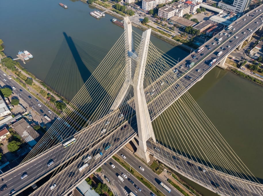 Aerial view of a modern cable-stayed bridge from directly above