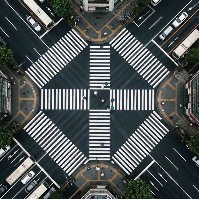 Overhead shot of a crosswalk on a city street from above
