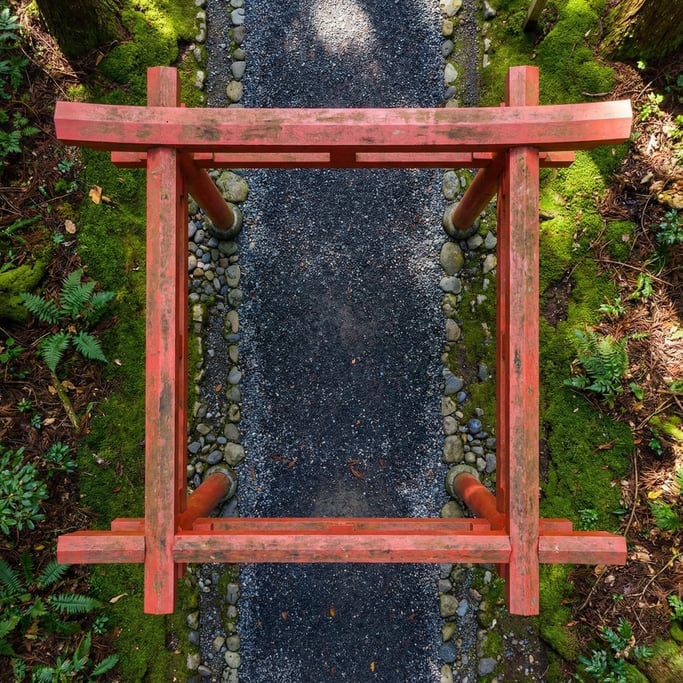 Overhead shot of a traditional Japanese torii gate from directly above