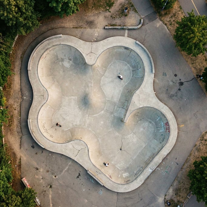 Top-down shot of a skate park bowl from above