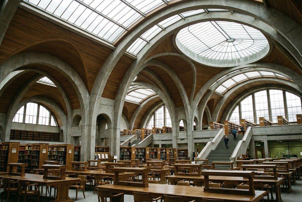 Grand reading room with rows of desks inside a university building