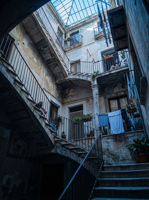 Looking up through a courtyard of a Sicilian palazzo