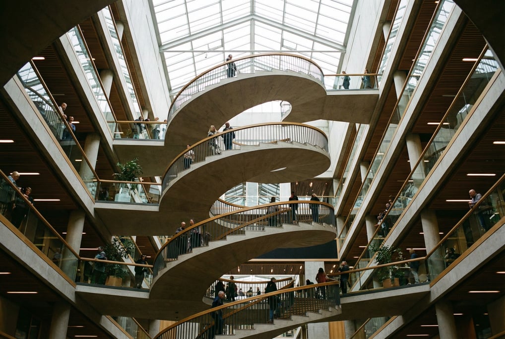Spiral staircase seen from below inside a civic center