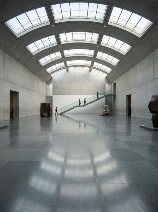 Vaulted gallery with skylights inside a modern art museum