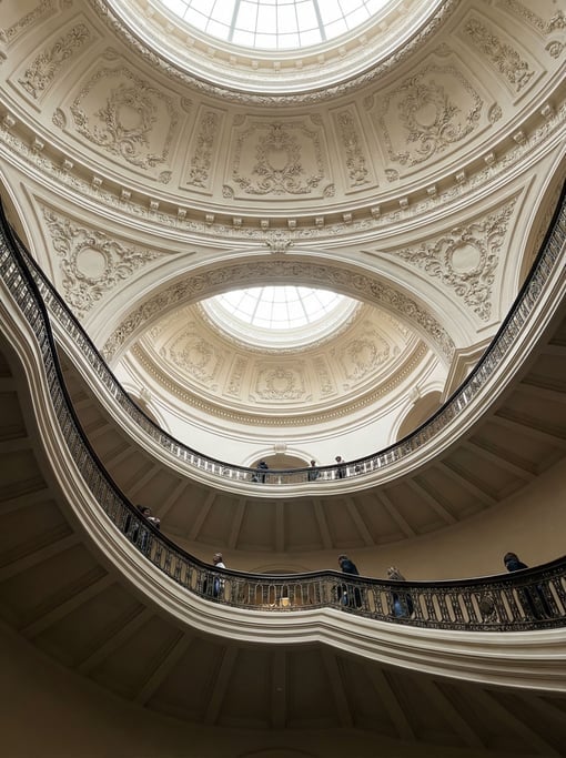 Spiral staircase seen from below inside a civic center