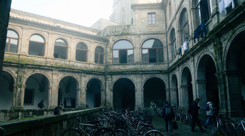 Looking up through a courtyard of a monastery cloister