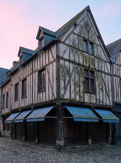 Half-timbered medieval merchant house with weathering stains and patina adding character, dawn