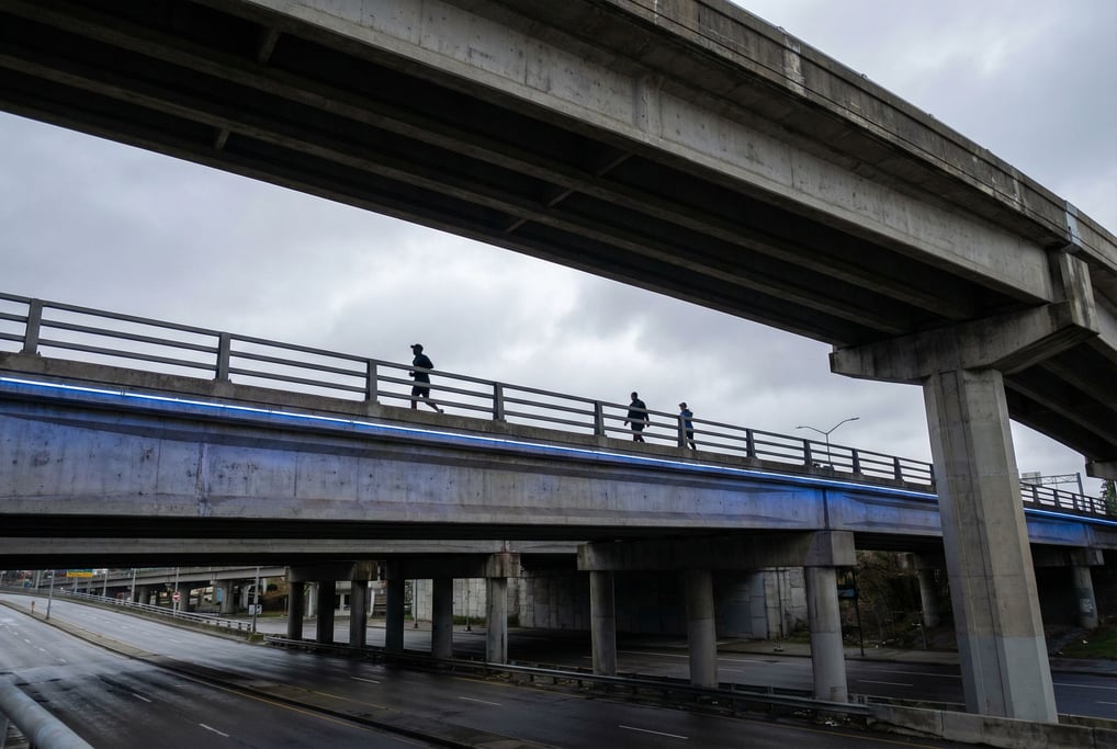 Concrete highway overpass seen from below at cloudy afternoon