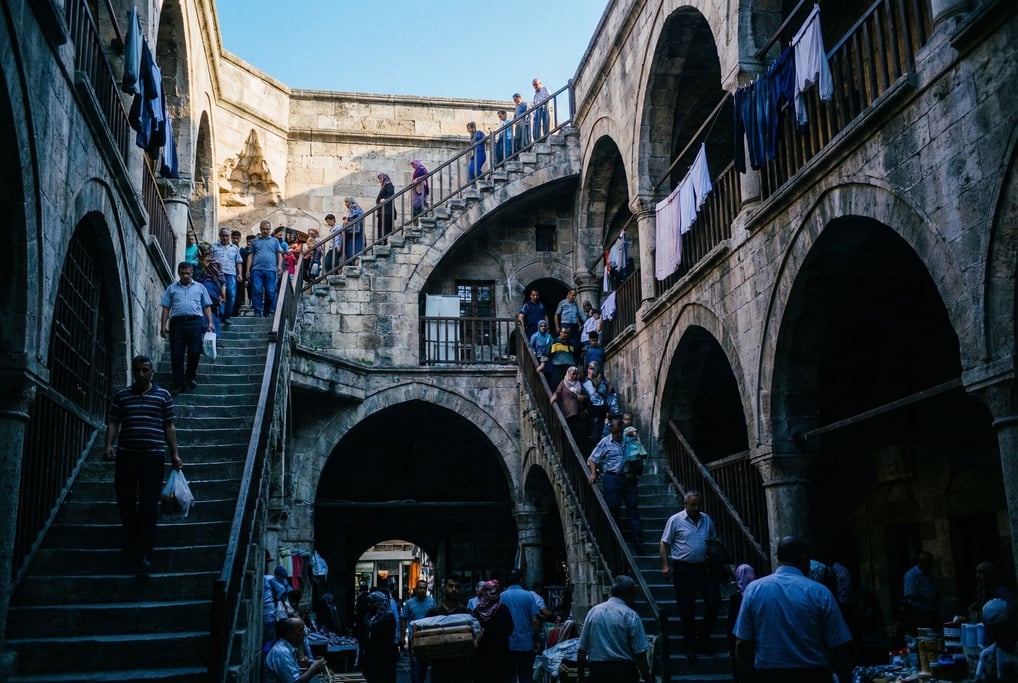 Looking up through a courtyard of a Ottoman-era caravanserai