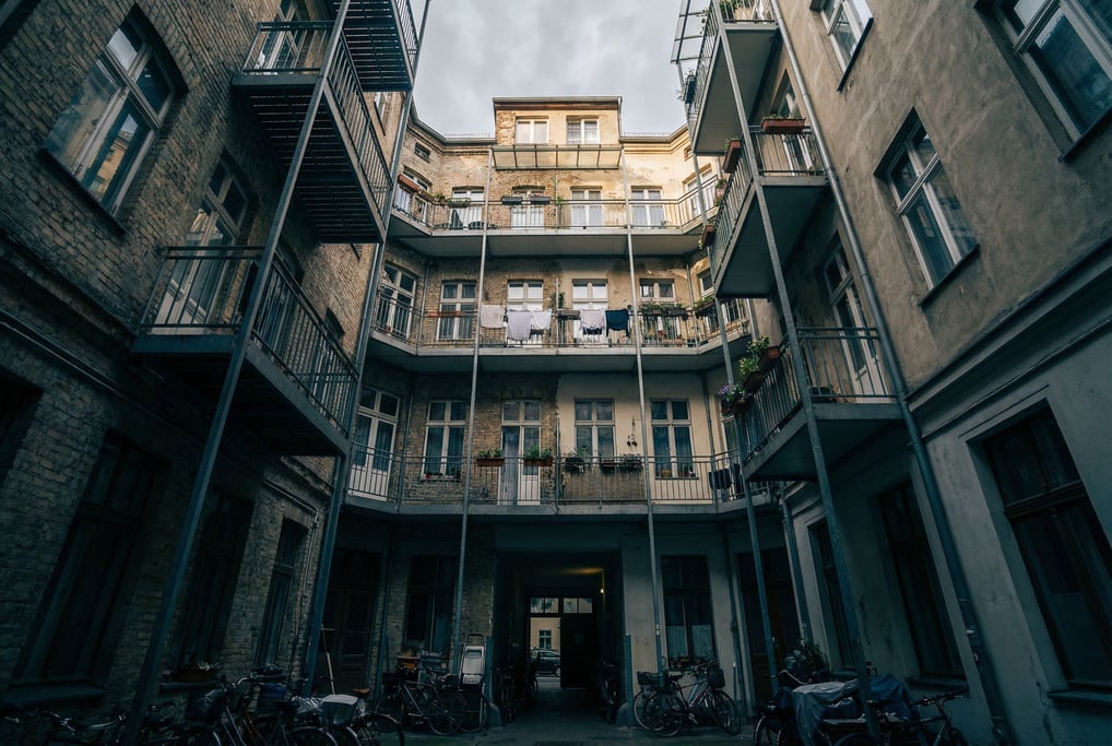 Looking up through a courtyard of a Berlin Hinterhof tenement