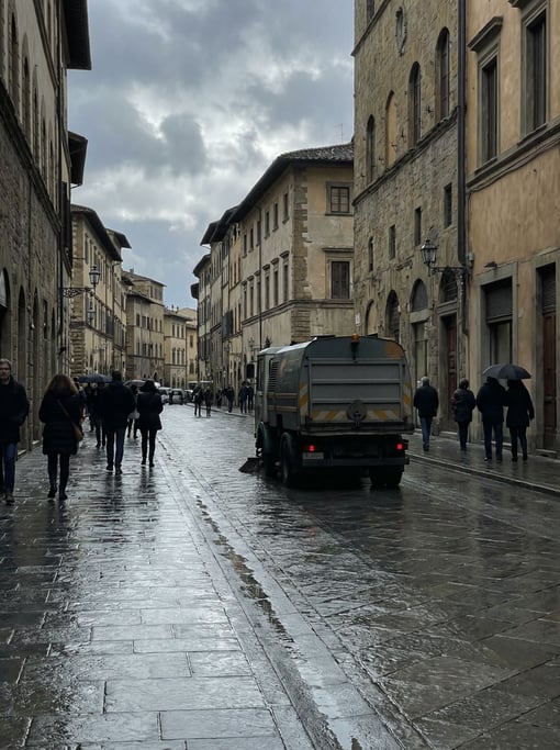 Historic city street under overcast skies, soft even light and muted tones