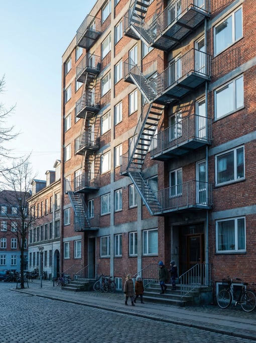 Mid-century modern apartment tower in a northern European neighborhood