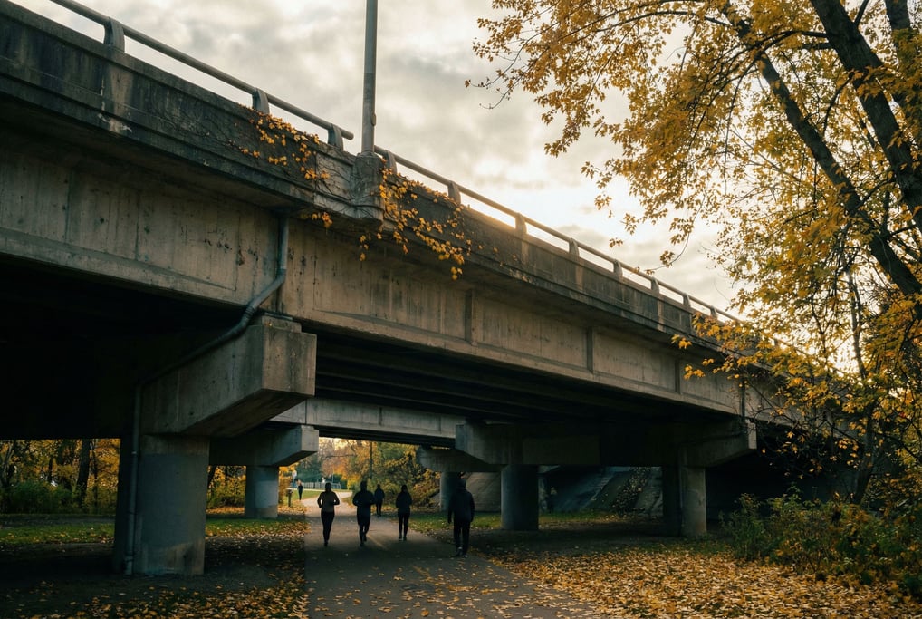 Concrete highway overpass seen from below on a crisp autumn day