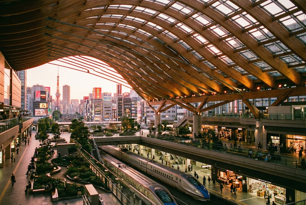 Modern transit hub with sweeping roof in a Tokyo