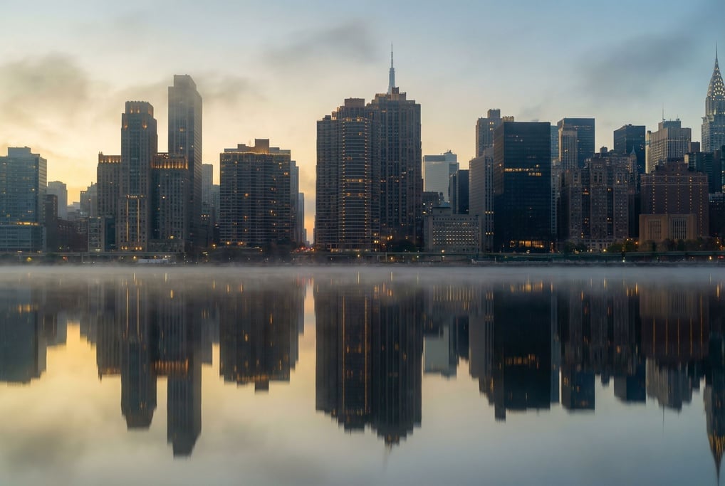 Art deco city skyline reflected in a calm river at misty morning