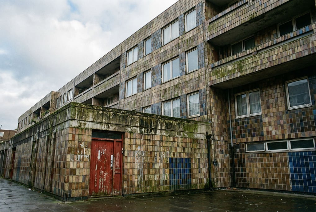Glazed ceramic tile apartment building with weathering stains and patina adding character