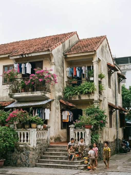 Mediterranean villa apartments with tile roofs in a tropical neighborhood