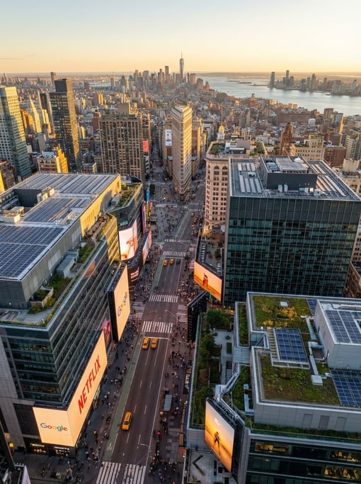 Panoramic view across Times Square with massive LED screens and contemporary billboards in New York
