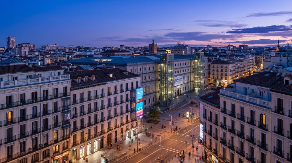 Elevated view from a hillside overlooking Madrid at blue hour dusk