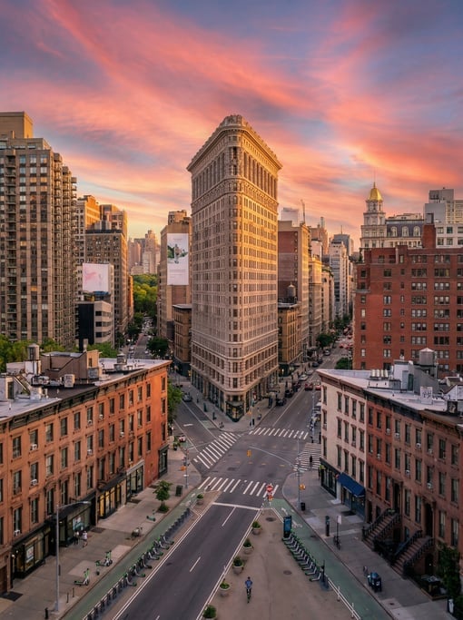 Elevated view from a hillside overlooking New York City at sunset