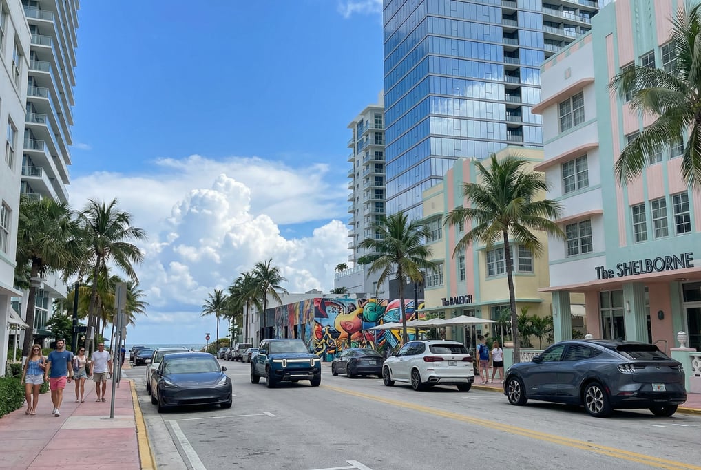Point-of-view shot walking through Collins Avenue with a mix of Deco and modern architecture in Miam
