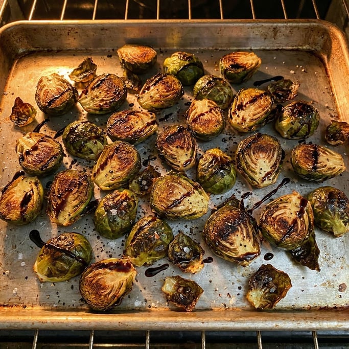 Brussels sprouts halved and roasted on a sheet pan