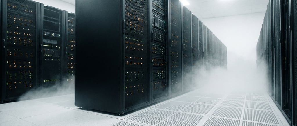 Ultra-wide panorama of a data center interior — the perspective is low, floor-level