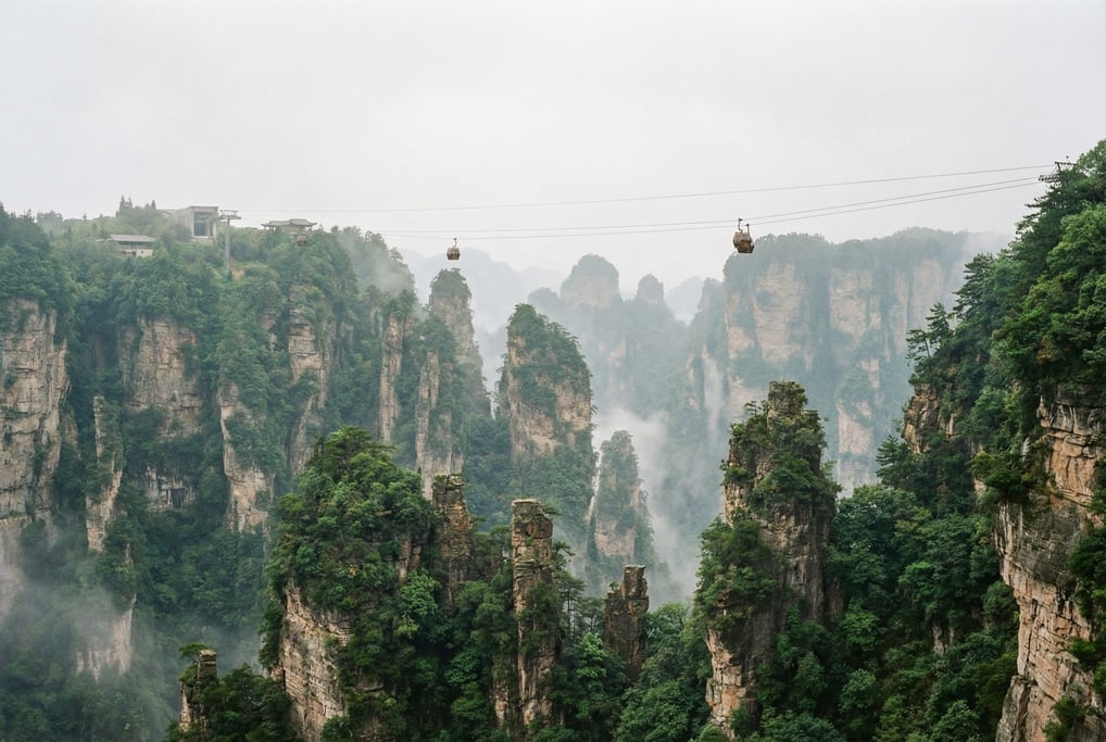 A karst landscape of dramatic limestone pillars with a cable car system connecting distant plateau s