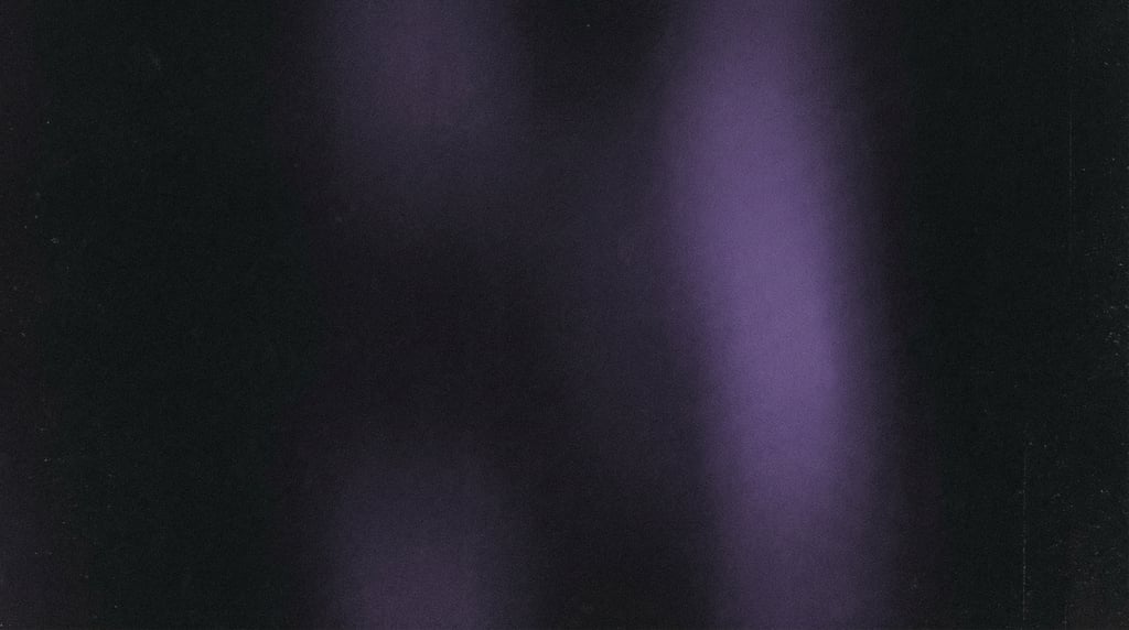 Dark grainy gradient abstract, near-black canvas with a soft vertical band of deep purple light alon