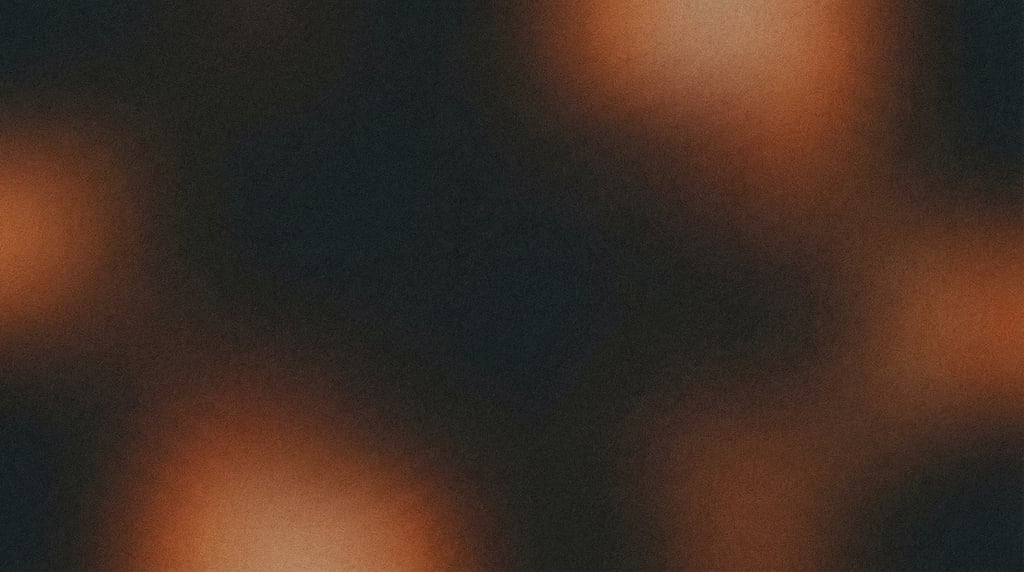 Dark grainy gradient, near-black canvas with soft diffused pools of warm terracotta and deep sienna
