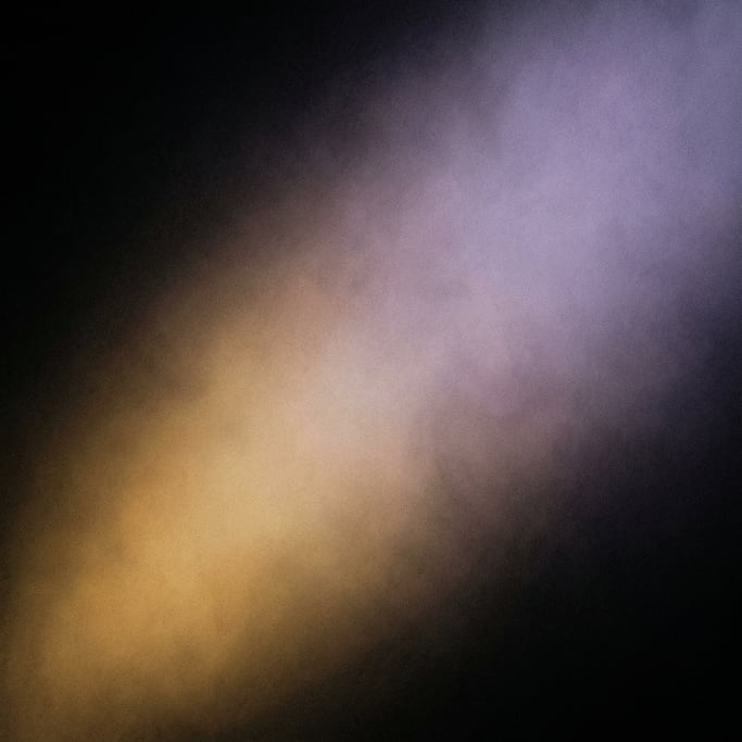 Dark moody gradient with fine noise texture