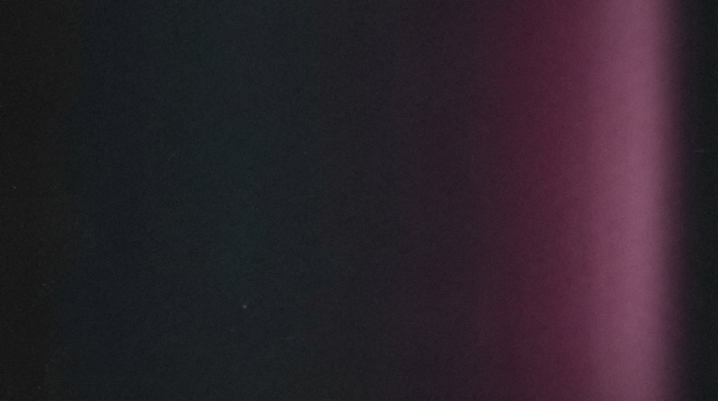 Dark gradient digital art with intentional grain