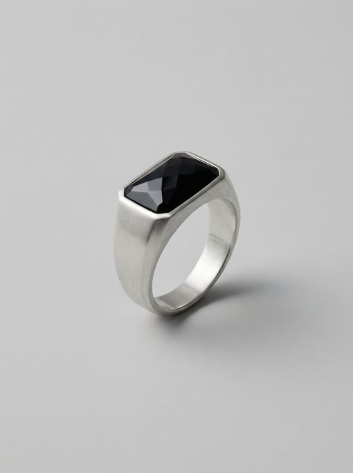 Geometric silver signet ring with a faceted rectangular black onyx cabochon set in a brushed sterlin