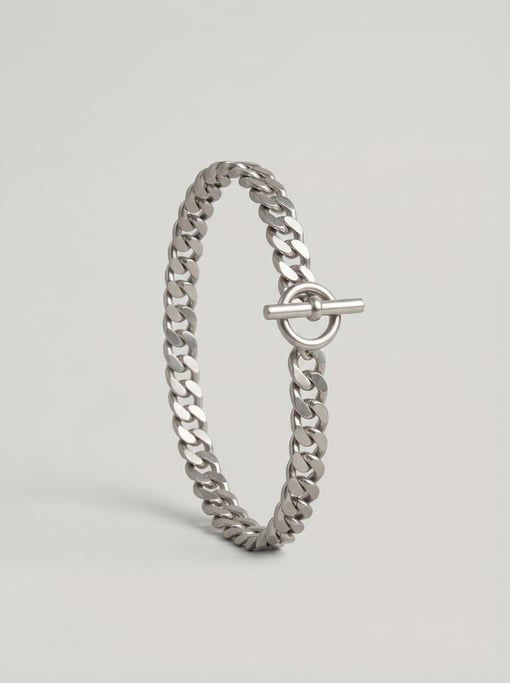 Chain-link waist belt in brushed silver metal with an oversized toggle clasp closure and flat curb l