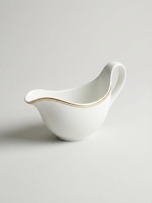 Porcelain gravy boat in classic white bone china with a single thin gold stripe and an elegant high-