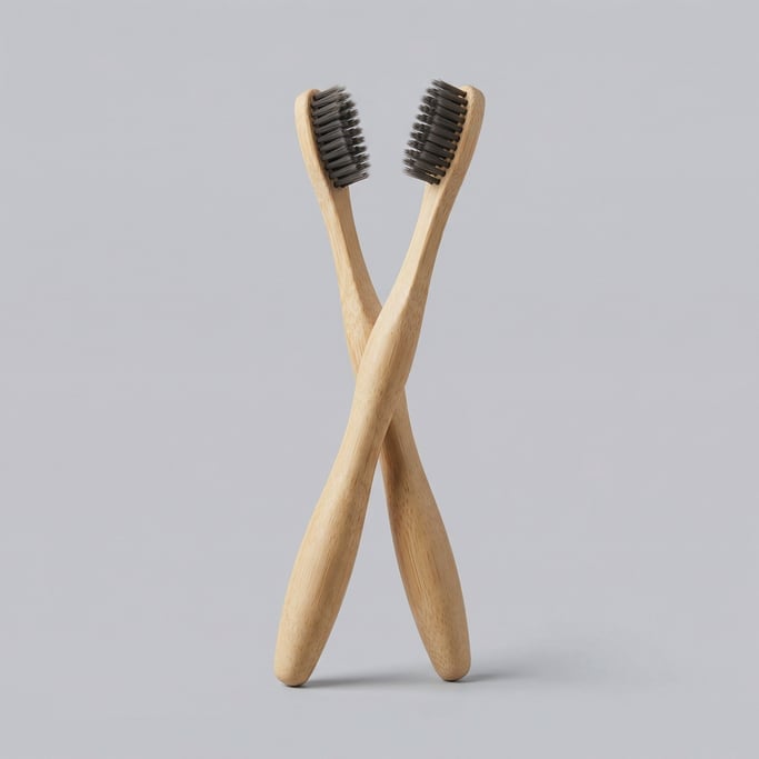 Bamboo toothbrush with a smooth moso bamboo handle, charcoal-infused soft nylon bristles